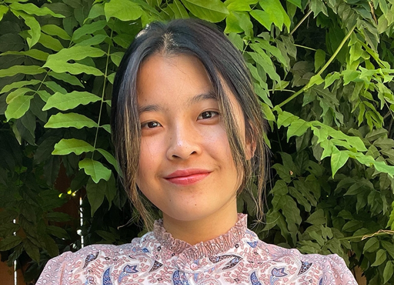 BPP Graduate Student Pear Intasin in front of a tree