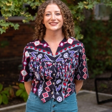 Araya Andersen standing outside in Cordley courtyard